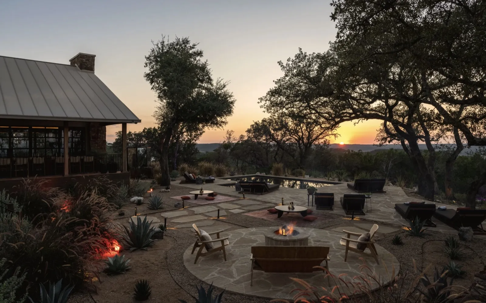 Fire pit and pool patio at sunset at HAVAN