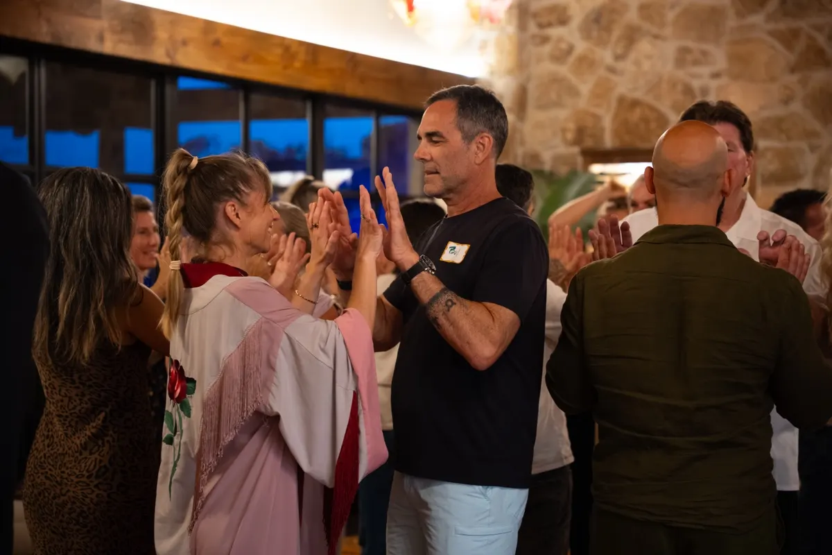 A partner exercise during a workshop at a Love Immersion